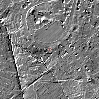 Shaded relief map of the ground around GL502SD, computed from Environment Agency LiDAR. The ground here sits at about 69 m above sea level and falls 22 m across the surrounding 800 m. Surface water reaching this point runs off ground lying to the east-north-east, 2.6 m higher.