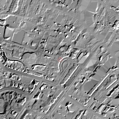 Shaded relief map of the ground around GL503DA, computed from Environment Agency LiDAR. The ground here sits at about 56 m above sea level and falls 20 m across the surrounding 800 m. Surface water reaching this point runs off ground lying to the south-west, 11.4 m higher.