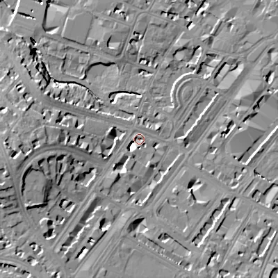 Shaded relief map of the ground around GL503EB, computed from Environment Agency LiDAR. The ground here sits at about 57 m above sea level and falls 23 m across the surrounding 800 m. Surface water reaching this point runs off ground lying to the south-west, 8.8 m higher.