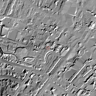 Shaded relief map of the ground around GL503PN, computed from Environment Agency LiDAR. The ground here sits at about 56 m above sea level and falls 19 m across the surrounding 800 m. Surface water reaching this point runs off ground lying to the north, 3.2 m higher.