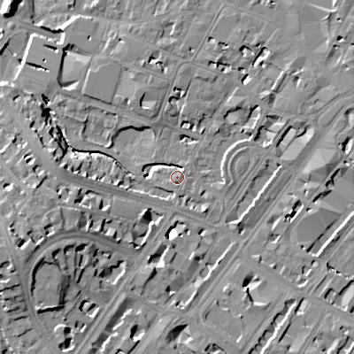 Shaded relief map of the ground around GL503QB, computed from Environment Agency LiDAR. The ground here sits at about 56 m above sea level and falls 23 m across the surrounding 800 m. Surface water reaching this point runs off ground lying to the west-south-west, 19.5 m higher.