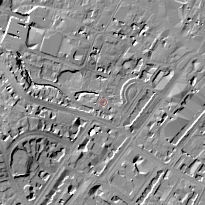 Shaded relief map of the ground around GL503QD, computed from Environment Agency LiDAR. The ground here sits at about 56 m above sea level and falls 23 m across the surrounding 800 m. Surface water reaching this point runs off ground lying to the south-west, 0.6 m higher.