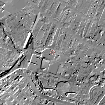 Shaded relief map of the ground around GL503QW, computed from Environment Agency LiDAR. The ground here sits at about 56 m above sea level and falls 22 m across the surrounding 800 m. Surface water reaching this point runs off ground lying to the south-east, 2.7 m higher.