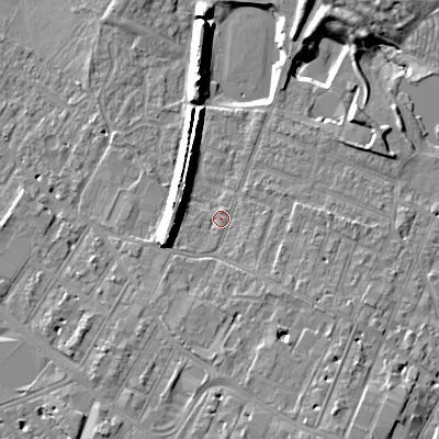 Shaded relief map of the ground around GL504BT, computed from Environment Agency LiDAR. The ground here sits at about 54 m above sea level and falls 12 m across the surrounding 800 m. Surface water reaching this point runs off ground lying to the south-south-east, 4.7 m higher.