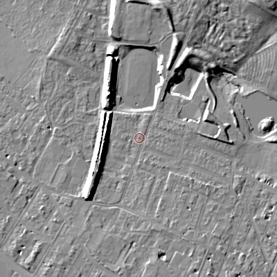 Shaded relief map of the ground around GL504BY, computed from Environment Agency LiDAR. The ground here sits at about 53 m above sea level and falls 13 m across the surrounding 800 m. Surface water reaching this point runs off ground lying to the south-south-east, 3.5 m higher.
