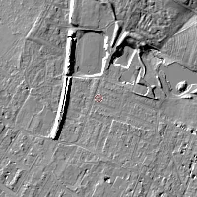 Shaded relief map of the ground around GL504BZ, computed from Environment Agency LiDAR. The ground here sits at about 53 m above sea level and falls 13 m across the surrounding 800 m. Surface water reaching this point runs off ground lying to the south-south-east, 3.5 m higher.