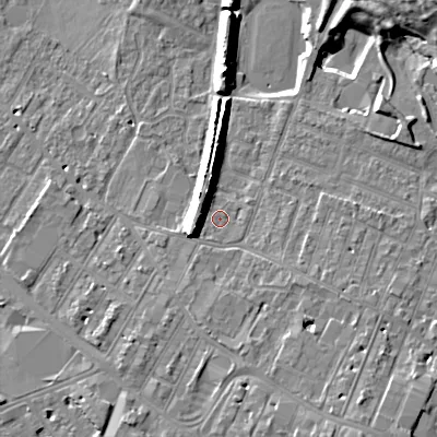 Shaded relief map of the ground around GL504DH, computed from Environment Agency LiDAR. The ground here sits at about 54 m above sea level and falls 12 m across the surrounding 800 m. Surface water reaching this point runs off ground lying to the west-south-west, 6.4 m higher.