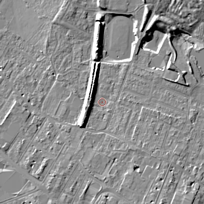 Shaded relief map of the ground around GL504DN, computed from Environment Agency LiDAR. The ground here sits at about 53 m above sea level and falls 12 m across the surrounding 800 m. Surface water reaching this point runs off ground lying to the south-west, 7.1 m higher.