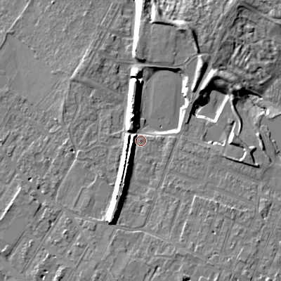 Shaded relief map of the ground around GL504EL, computed from Environment Agency LiDAR. The ground here sits at about 53 m above sea level and falls 16 m across the surrounding 800 m. Surface water reaching this point runs off ground lying to the south-south-west, 7.9 m higher.