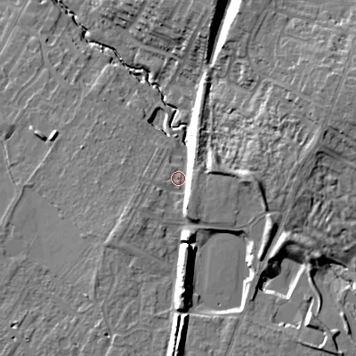 Shaded relief map of the ground around GL504GN, computed from Environment Agency LiDAR. The ground here sits at about 49 m above sea level and falls 22 m across the surrounding 800 m. Surface water reaching this point runs off ground lying to the east-north-east, 14.1 m higher.