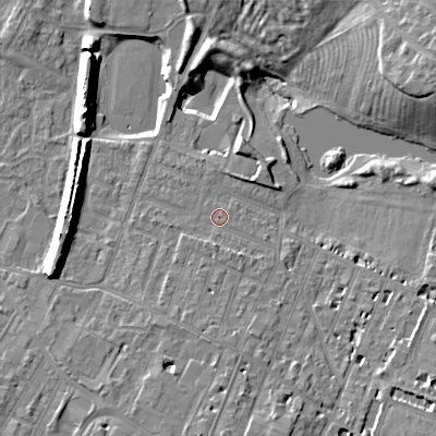 Shaded relief map of the ground around GL504HG, computed from Environment Agency LiDAR. The ground here sits at about 54 m above sea level and falls 14 m across the surrounding 800 m. Surface water reaching this point runs off ground lying to the south-south-east, 1.9 m higher.