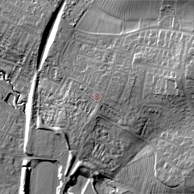 Shaded relief map of the ground around GL504NL, computed from Environment Agency LiDAR. The ground here sits at about 61 m above sea level and falls 25 m across the surrounding 800 m. Surface water reaching this point runs off ground lying to the east-north-east, 1.3 m higher.