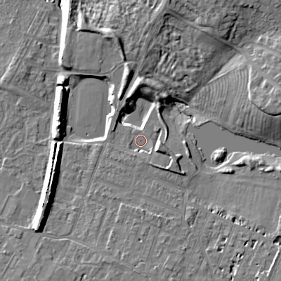 Shaded relief map of the ground around GL504RN, computed from Environment Agency LiDAR. The ground here sits at about 52 m above sea level and falls 18 m across the surrounding 800 m. Surface water reaching this point runs off ground lying to the east-south-east, 3.8 m higher.