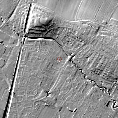 Shaded relief map of the ground around GL504SN, computed from Environment Agency LiDAR. The ground here sits at about 43 m above sea level and falls 22 m across the surrounding 800 m. Surface water reaching this point runs off ground lying to the south-south-west, 6.7 m higher.