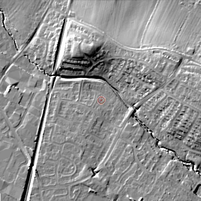 Shaded relief map of the ground around GL504SQ, computed from Environment Agency LiDAR. The ground here sits at about 42 m above sea level and falls 21 m across the surrounding 800 m. Surface water reaching this point runs off ground lying to the south-south-west, 4.1 m higher.