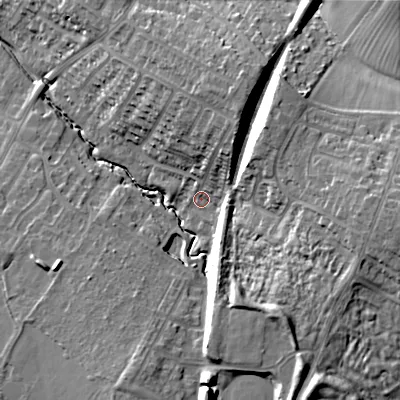 Shaded relief map of the ground around GL504ST, computed from Environment Agency LiDAR. The ground here sits at about 48 m above sea level and falls 23 m across the surrounding 800 m. Surface water reaching this point runs off ground lying to the east, 16.2 m higher.