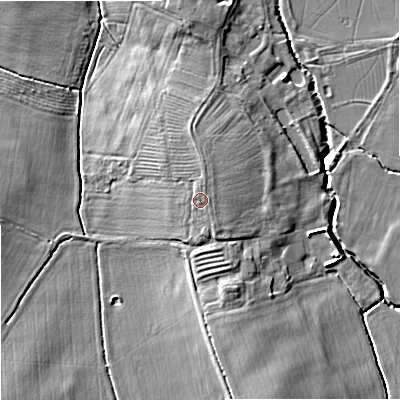 Shaded relief map of the ground around GL510TJ, computed from Environment Agency LiDAR. The ground here sits at about 26 m above sea level and falls 8 m across the surrounding 800 m. The ground contributing surface water to this point lies to the south-south-east.