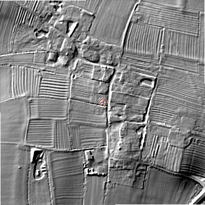 Shaded relief map of the ground around GL510TW, computed from Environment Agency LiDAR. The ground here sits at about 32 m above sea level and falls 9 m across the surrounding 800 m. Surface water reaching this point runs off ground lying to the east-north-east, 2.6 m higher.