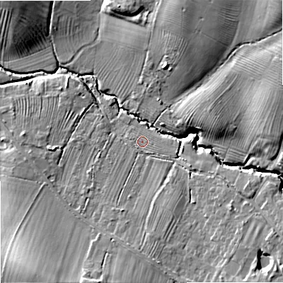 Shaded relief map of the ground around GL510XX, computed from Environment Agency LiDAR. The ground here sits at about 32 m above sea level and falls 15 m across the surrounding 800 m. Surface water reaching this point runs off ground lying to the south-east, 1.2 m higher.