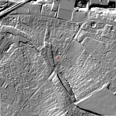Shaded relief map of the ground around GL513LU, computed from Environment Agency LiDAR. The ground here sits at about 50 m above sea level and falls 18 m across the surrounding 800 m. Surface water reaching this point runs off ground lying to the east, 10.2 m higher.
