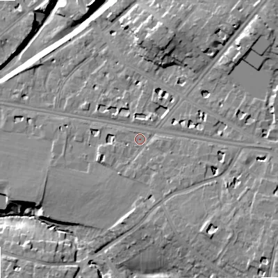 Shaded relief map of the ground around GL516QX, computed from Environment Agency LiDAR. The ground here sits at about 59 m above sea level and falls 19 m across the surrounding 800 m. Surface water reaching this point runs off ground lying to the east-south-east, 2.9 m higher.