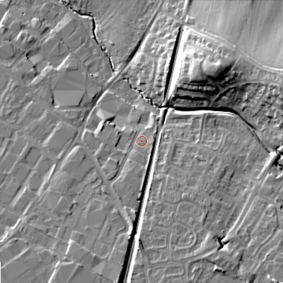 Shaded relief map of the ground around GL519LT, computed from Environment Agency LiDAR. The ground here sits at about 43 m above sea level and falls 16 m across the surrounding 800 m. Surface water reaching this point runs off ground lying to the south, 3.1 m higher.