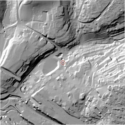 Shaded relief map of the ground around GL51QG, computed from Environment Agency LiDAR. The ground here sits at about 52 m above sea level and falls 65 m across the surrounding 800 m. Surface water reaching this point runs off ground lying to the east-south-east, 53.2 m higher.