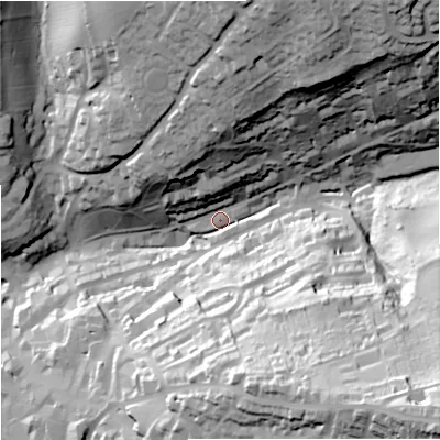 Shaded relief map of the ground around GL51UT, computed from Environment Agency LiDAR. The ground here sits at about 53 m above sea level and falls 84 m across the surrounding 800 m. Surface water reaching this point runs off ground lying to the north-north-east, 50.3 m higher.