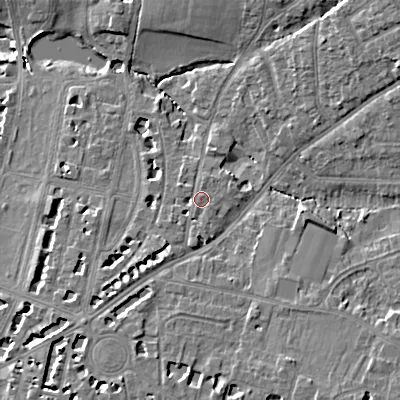 Shaded relief map of the ground around GL522DG, computed from Environment Agency LiDAR. The ground here sits at about 60 m above sea level and falls 13 m across the surrounding 800 m. Surface water reaching this point runs off ground lying to the south-west, 2.1 m higher.