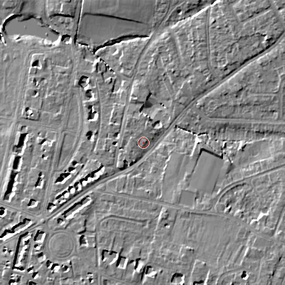 Shaded relief map of the ground around GL522DJ, computed from Environment Agency LiDAR. The ground here sits at about 59 m above sea level and falls 13 m across the surrounding 800 m. Surface water reaching this point runs off ground lying to the west-north-west, 1.2 m higher.