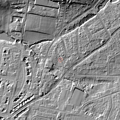 Shaded relief map of the ground around GL522DQ, computed from Environment Agency LiDAR. The ground here sits at about 59 m above sea level and falls 15 m across the surrounding 800 m. Surface water reaching this point runs off ground lying to the north-north-east, 2.2 m higher.