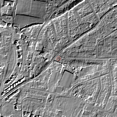 Shaded relief map of the ground around GL522DT, computed from Environment Agency LiDAR. The ground here sits at about 59 m above sea level and falls 13 m across the surrounding 800 m. Surface water reaching this point runs off ground lying to the north-east, 10.5 m higher.