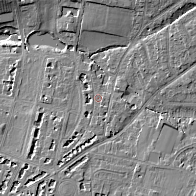 Shaded relief map of the ground around GL522RA, computed from Environment Agency LiDAR. The ground here sits at about 59 m above sea level and falls 14 m across the surrounding 800 m. Surface water reaching this point runs off ground lying to the south, 3.1 m higher.