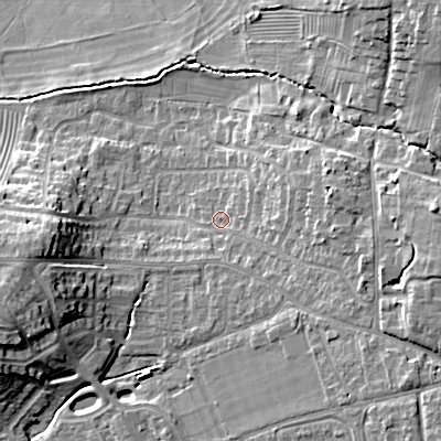 Shaded relief map of the ground around GL523DR, computed from Environment Agency LiDAR. The ground here sits at about 66 m above sea level and falls 19 m across the surrounding 800 m. Surface water reaching this point runs off ground lying to the east, 9.4 m higher.