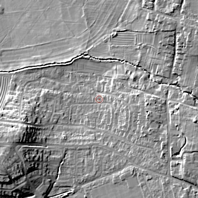Shaded relief map of the ground around GL523DY, computed from Environment Agency LiDAR. The ground here sits at about 66 m above sea level and falls 21 m across the surrounding 800 m. Surface water reaching this point runs off ground lying to the east, 6.5 m higher.