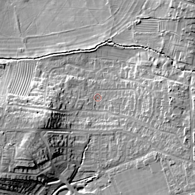 Shaded relief map of the ground around GL523EA, computed from Environment Agency LiDAR. The ground here sits at about 64 m above sea level and falls 19 m across the surrounding 800 m. Surface water reaching this point runs off ground lying to the west-south-west, 11.1 m higher.