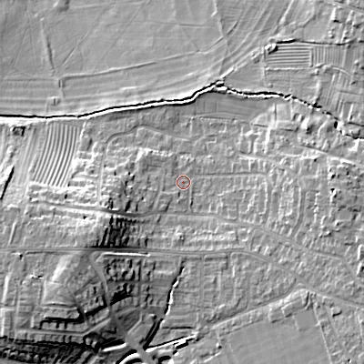 Shaded relief map of the ground around GL523EB, computed from Environment Agency LiDAR. The ground here sits at about 65 m above sea level and falls 19 m across the surrounding 800 m. Surface water reaching this point runs off ground lying to the south-west, 11.2 m higher.