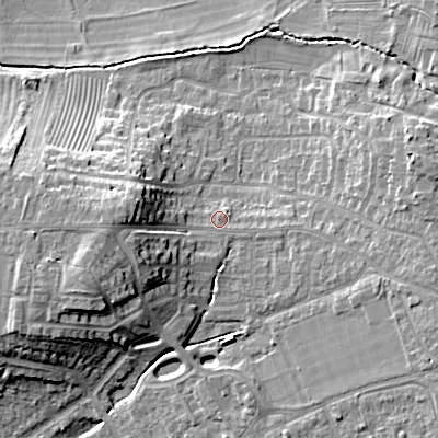 Shaded relief map of the ground around GL523LH, computed from Environment Agency LiDAR. The ground here sits at about 67 m above sea level and falls 17 m across the surrounding 800 m. Surface water reaching this point runs off ground lying to the west, 9.0 m higher.