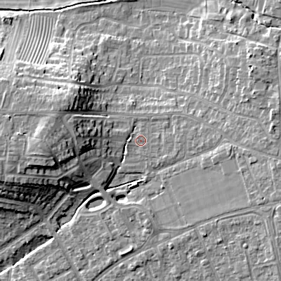 Shaded relief map of the ground around GL523LJ, computed from Environment Agency LiDAR. The ground here sits at about 68 m above sea level and falls 16 m across the surrounding 800 m. Surface water reaching this point runs off ground lying to the west, 9.6 m higher.