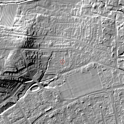 Shaded relief map of the ground around GL523LL, computed from Environment Agency LiDAR. The ground here sits at about 68 m above sea level and falls 16 m across the surrounding 800 m. Surface water reaching this point runs off ground lying to the east-south-east, 0.9 m higher.