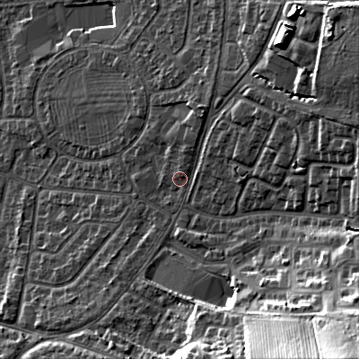 Shaded relief map of the ground around GL525AN, computed from Environment Agency LiDAR. The ground here sits at about 69 m above sea level and falls 35 m across the surrounding 800 m. Surface water reaching this point runs off ground lying to the north-east, 14.0 m higher.