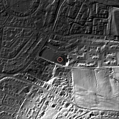 Shaded relief map of the ground around GL525AQ, computed from Environment Agency LiDAR. The ground here sits at about 70 m above sea level and falls 64 m across the surrounding 800 m. Surface water reaching this point runs off ground lying to the south-east, 51.3 m higher.