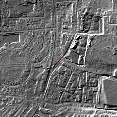 Shaded relief map of the ground around GL525AT, computed from Environment Agency LiDAR. The ground here sits at about 72 m above sea level and falls 21 m across the surrounding 800 m. Surface water reaching this point runs off ground lying to the east-north-east, 12.7 m higher.