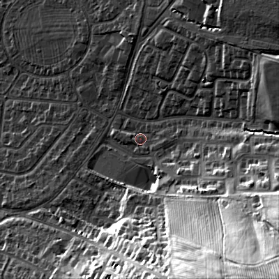 Shaded relief map of the ground around GL525GB, computed from Environment Agency LiDAR. The ground here sits at about 70 m above sea level and falls 54 m across the surrounding 800 m. Surface water reaching this point runs off ground lying to the south-east, 28.3 m higher.