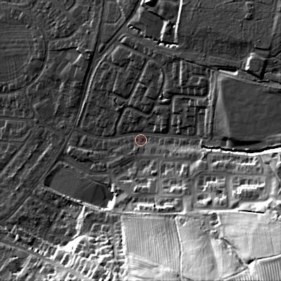 Shaded relief map of the ground around GL525JU, computed from Environment Agency LiDAR. The ground here sits at about 71 m above sea level and falls 52 m across the surrounding 800 m. Surface water reaching this point runs off ground lying to the south-east, 46.8 m higher.