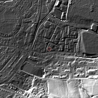 Shaded relief map of the ground around GL525JX, computed from Environment Agency LiDAR. The ground here sits at about 71 m above sea level and falls 48 m across the surrounding 800 m. Surface water reaching this point runs off ground lying to the east-north-east, 13.3 m higher.