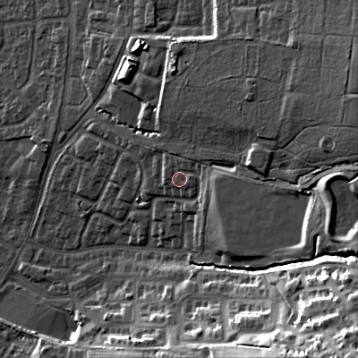 Shaded relief map of the ground around GL525JZ, computed from Environment Agency LiDAR. The ground here sits at about 77 m above sea level and falls 41 m across the surrounding 800 m. Surface water reaching this point runs off ground lying to the east-north-east, 14.3 m higher.