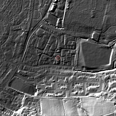 Shaded relief map of the ground around GL525LB, computed from Environment Agency LiDAR. The ground here sits at about 73 m above sea level and falls 48 m across the surrounding 800 m. Surface water reaching this point runs off ground lying to the east-north-east, 2.6 m higher.