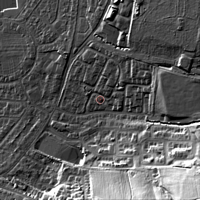 Shaded relief map of the ground around GL525LD, computed from Environment Agency LiDAR. The ground here sits at about 72 m above sea level and falls 48 m across the surrounding 800 m. Surface water reaching this point runs off ground lying to the east-north-east, 12.2 m higher.