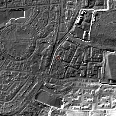 Shaded relief map of the ground around GL525LF, computed from Environment Agency LiDAR. The ground here sits at about 71 m above sea level and falls 32 m across the surrounding 800 m. Surface water reaching this point runs off ground lying to the north-east, 1.8 m higher.